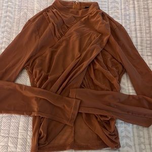 Sheer long sleeve top, brown, mock neck.